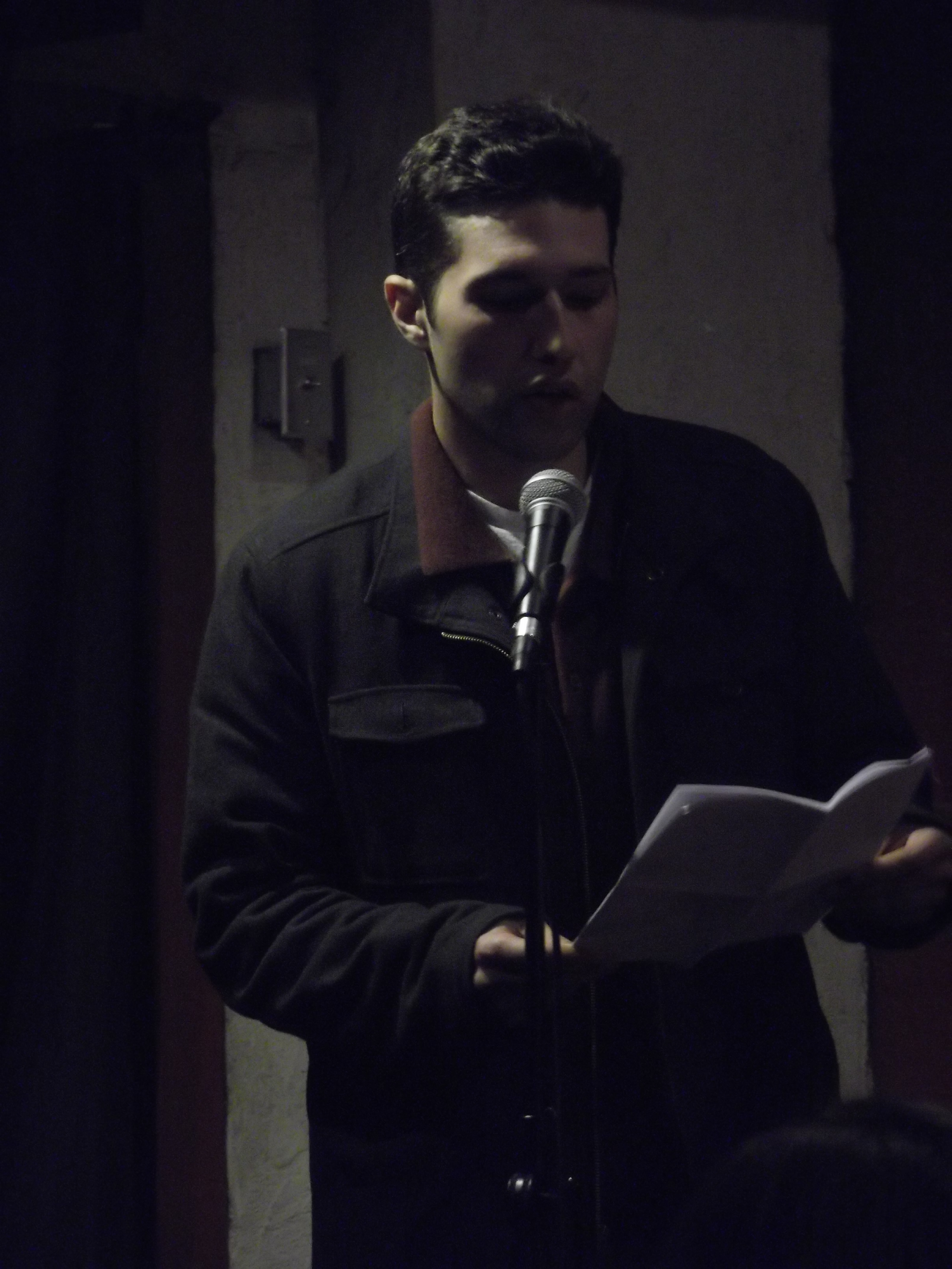 Alex Gallo-Brown gives a great reading at the Java Monkey after the conference. 